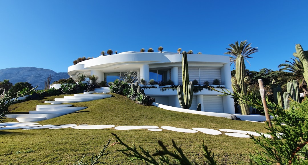 white-concrete-building-under-blue-sky-during-daytime-bp1ze0qcp-c